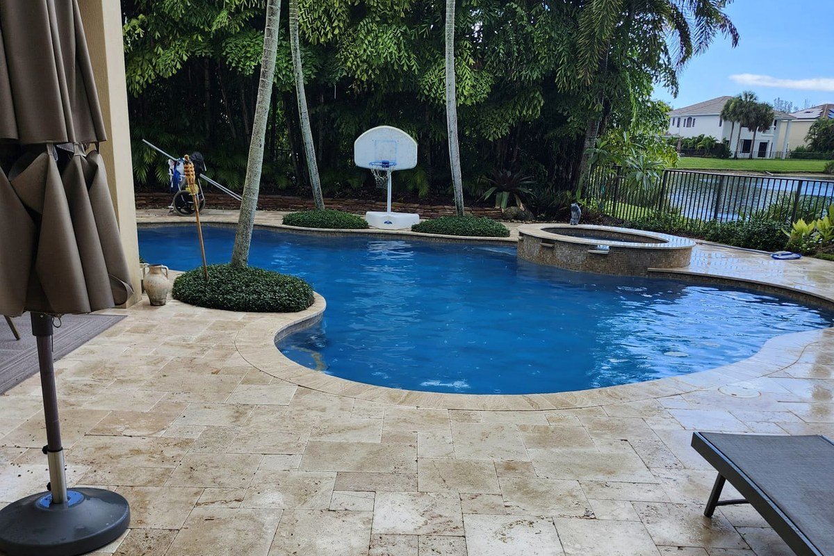 Real Curveside customer pool with spa, crystal-clear water