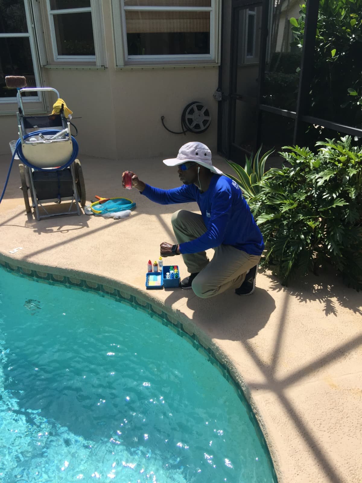 Crystal-clear balanced pool water over a tiled surface